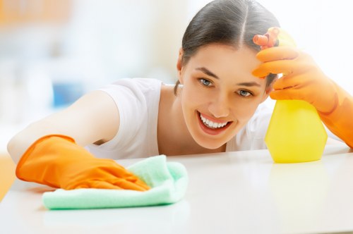 Professional oven cleaner in Watford cleaning a kitchen oven