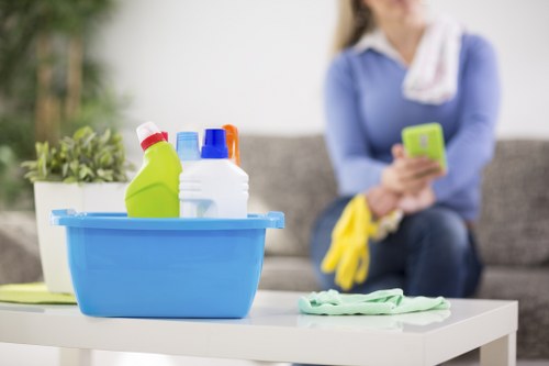 Cleaning technician checking floor condition and treatment area