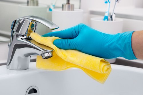 Professional Watford carpet cleaners working safely with cleaning machines